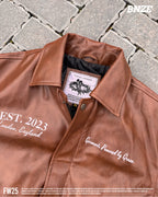 “Jesus Is Lord” (J.I.L) Vegan Leather Jacket in Cocoa Brown. (Only 100 made.)