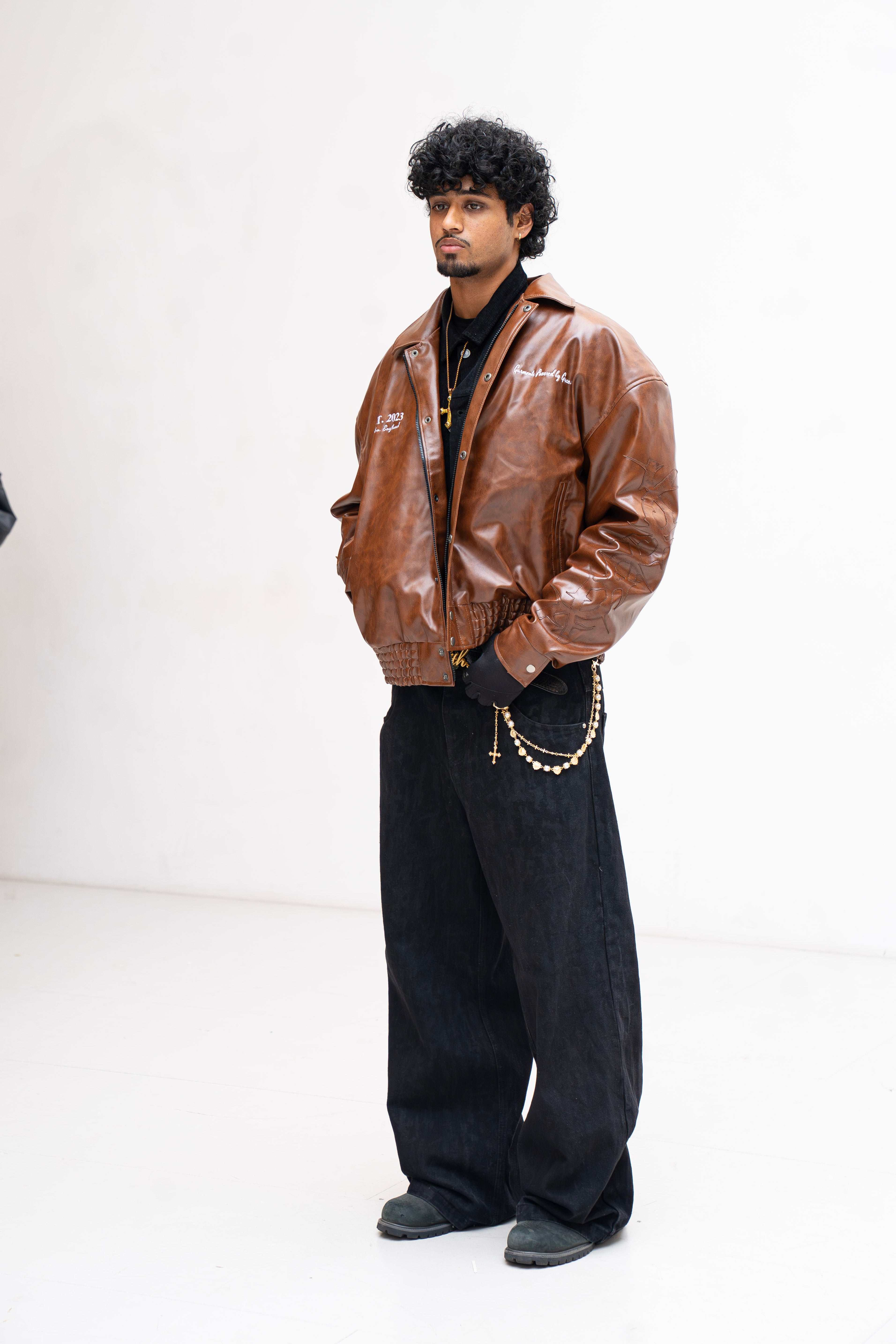 “Jesus Is Lord” (J.I.L) Vegan Leather Jacket in Cocoa Brown.