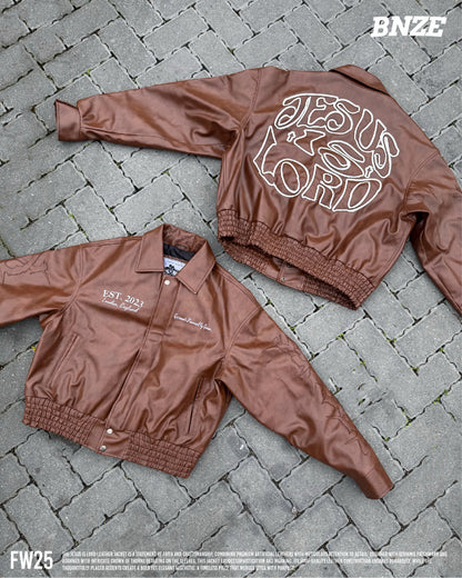 “Jesus Is Lord” (J.I.L) Vegan Leather Jacket in Cocoa Brown.