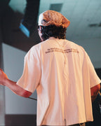 The 15:9 Tee in off-white.