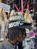 The “DISCIPLE” Snapback Cap.