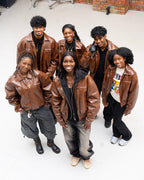 “Jesus Is Lord” (J.I.L) Vegan Leather Jacket in Cocoa Brown.